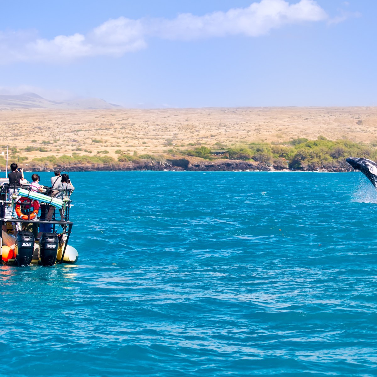 a small boat in a large body of water